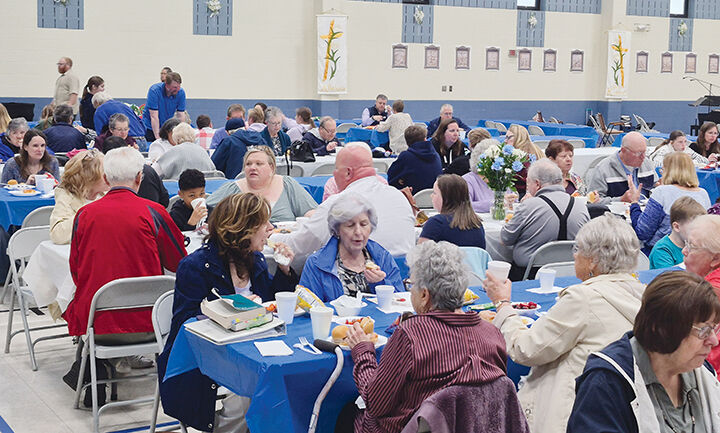 Members of the Holy Family Catholic Parish in Arnold gathered for a brunch after a remembrance walk and prayer service were held April 27 outside of the Immaculate Conception Church, 2300 Church Road, in Arnold.